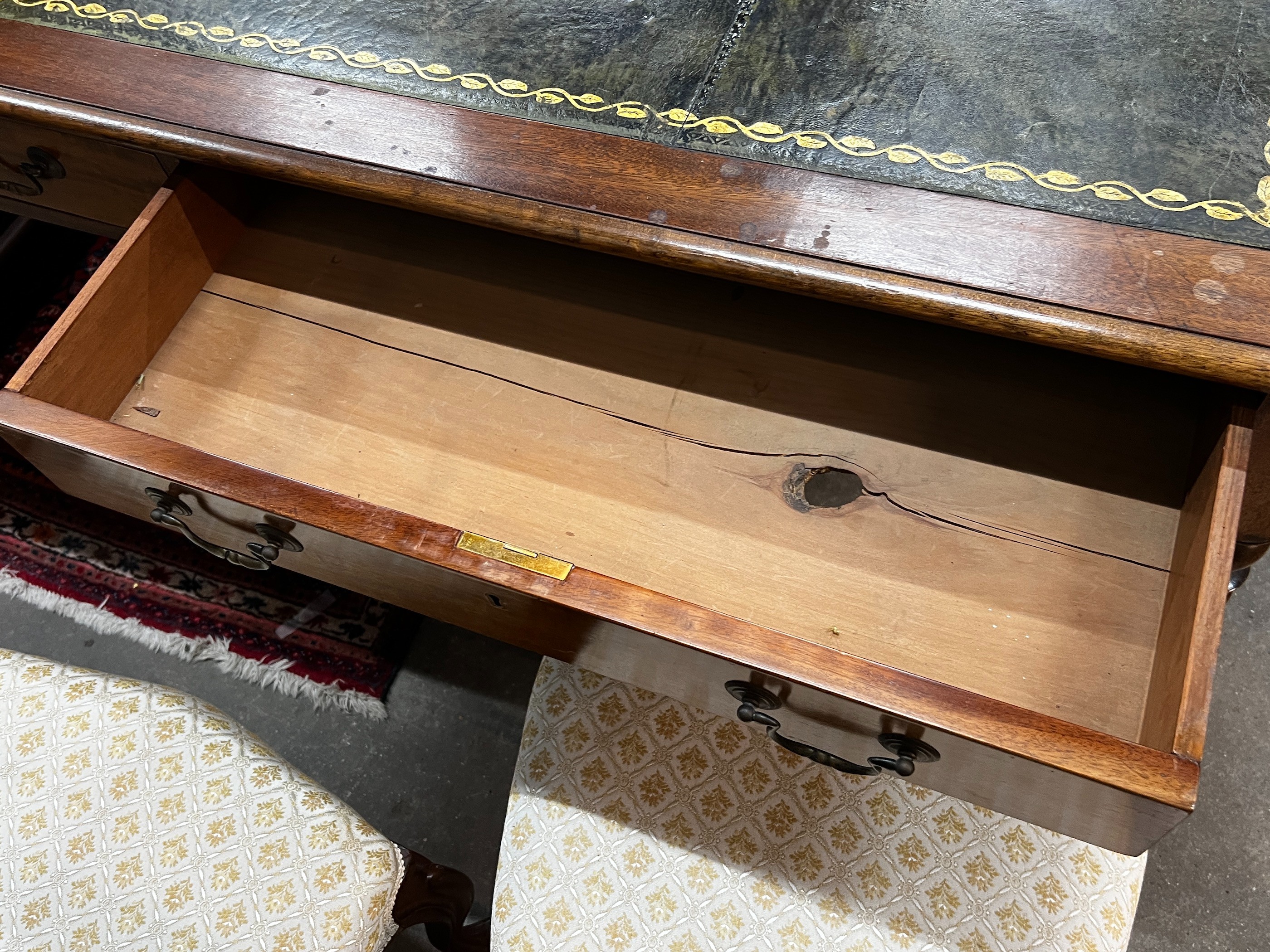 A Victorian style mahogany partner's writing table, width 154cm, depth 102cm, height 79cm